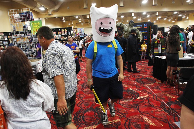 An attendee walks the aisles wearing a mask at the Amazing Las Vegas Comic Con at the South Point Saturday, June 15, 2013.
