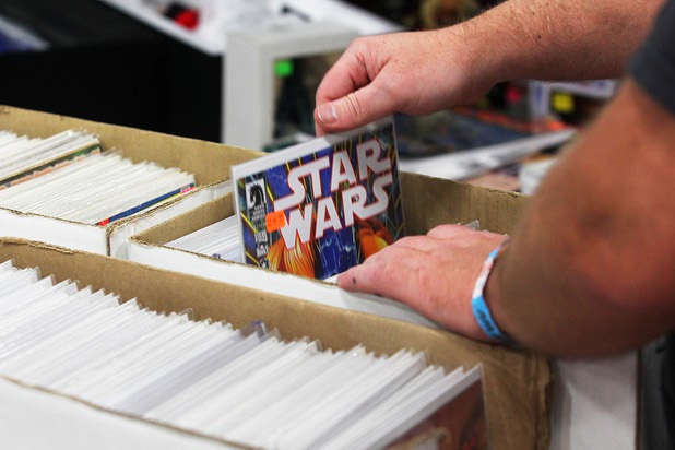 An attendee looks through comic books at the Amazing Las Vegas Comic Con at the South Point Saturday, June 15, 2013.