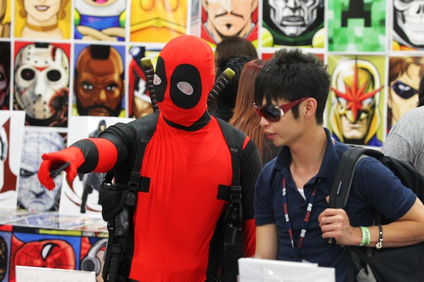 Minh Tran, left, and Andrew Sevila check out the offerings on the show floor at the Amazing Las Vegas Comic Con at the South Point Saturday, June 15, 2013.