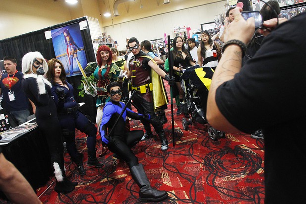 People dressed as various characters pose for a photo at the Amazing Las Vegas Comic Con at the South Point Saturday, June 15, 2013.