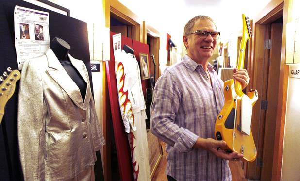 Warwick Stone, the curator and creative consultant for Hard Rock Hotel, shows off the hotel's rock memorabilia collection on Monday, June 17, 2013 at the Hard Rock Hotel in Las Vegas.