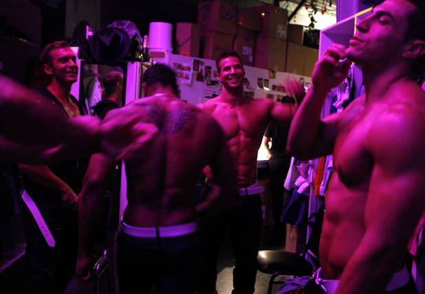 Chippendales dancers get ready in their backstage dressing area before their show on Tuesday, June 18, 2013 at the Rio in Las Vegas.