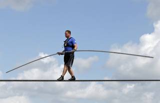 High wire performer Nik Wallenda practices Tuesday, June 18, 2013 in Sarasota, Fla.  Wallenda, a seventh generation high-wire walker, will attempt to walk across the Grand Canyon on Sunday, June 23, 2013.  