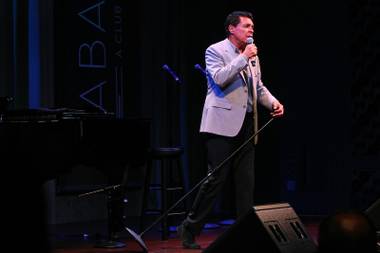 Clint Holmes performs during a performance of the Broadway-based open mic and variety show Cast Party Wednesday, June 19, 2013 at Cabaret Jazz at the Smith Center.