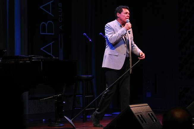 Clint Holmes performs during a performance of the Broadway-based open mic and variety show Cast Party Wednesday, June 19, 2013 at Cabaret Jazz at the Smith Center.
