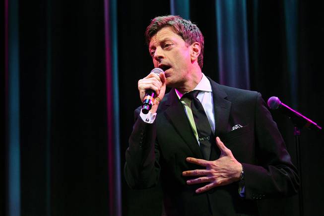 Host Jim Caruso sings during a performance of the Broadway-based open mic and variety show Cast Party Wednesday, June 19, 2013 at Cabaret Jazz at the Smith Center.