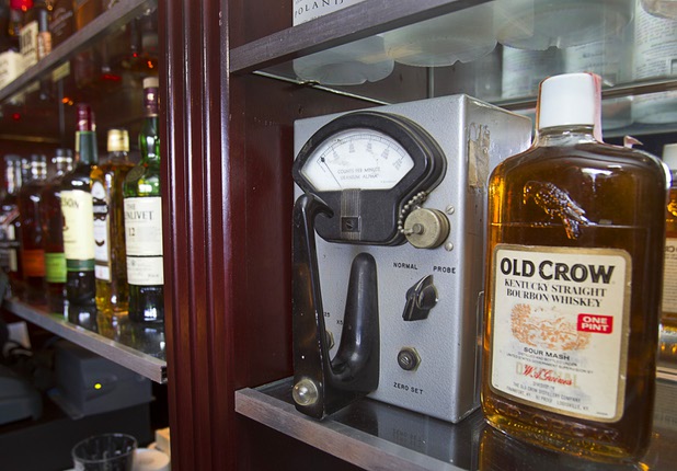 A Geiger counter, on loan from the National Atomic Testing Museum, is displayed on a shelf during the grand reopening of The Atomic on East Fremont Street Wednesday, June 20, 2013. The bar was originally built in 1945 as Virginia's Cafe but was renamed Atomic Liquors in 1952 when patrons used to go to the roof to watch the nuclear blasts from the Atomic Test Site.