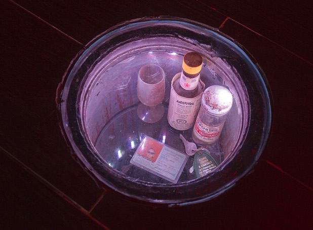Items are shown in a floor safe before the grand reopening of The Atomic on East Fremont Street Wednesday, June 20, 2013. The safe was discovered during remodeling but contained little beyond some 59-year-old receipts for soda and liquor. The bar was originally built in 1945 as Virginia's Cafe but was renamed Atomic Liquors in 1952 when patrons used to go to the roof to watch the nuclear blasts from the Atomic Test Site.