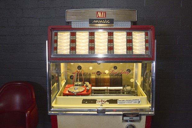 A 1955 AMI Rowe Jukebox is displayed at The Atomic on East Fremont Street Wednesday, June 20, 2013. The bar originally opened in 1945 as Virginia's Cafe but was renamed Atomic Liquors in 1952 when patrons used to go to the roof to watch the nuclear blasts from the Atomic Test Site.