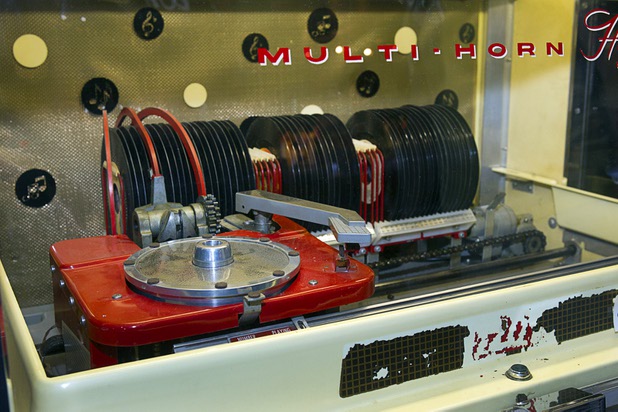 A 1955 AMI Rowe Jukebox is displayed at The Atomic on East Fremont Street Wednesday, June 20, 2013. The bar was originally built in 1945 as Virginia's Cafe but was renamed Atomic Liquors in 1952 when patrons used to go to the roof to watch the nuclear blasts from the Atomic Test Site.