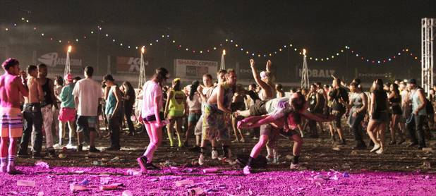 Fans enjoy the Dirtyphonics' set at the Electric Daisy Carnival Festival, EDC, at the Las Vegas Motor Speedway, Sunday morning, June 23, 2013.