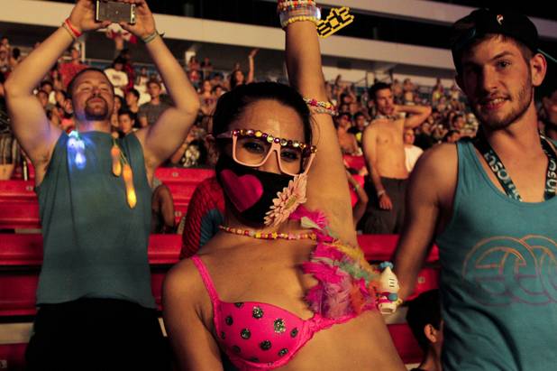 Fans of Major Lazer enjoy the set from the stands at the Electric Daisy Carnival Festival, EDC, at the Las Vegas Motor Speedway, Sunday morning, June 23, 2013.