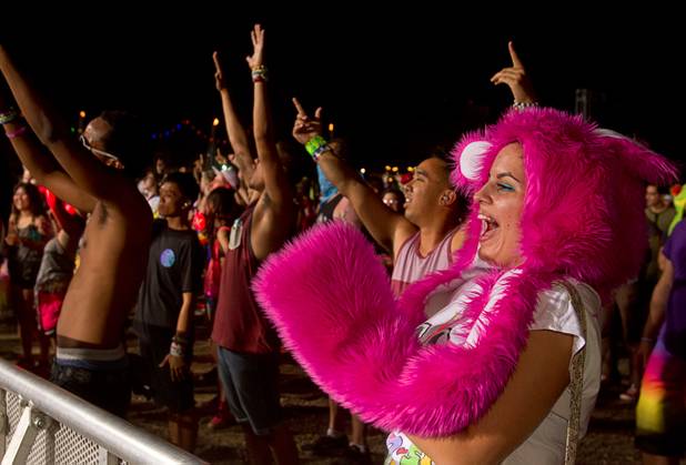 Sophie Pike, 20, of Las Vegas, cheers during the third day of the Electric Daisy Carnival at the Las Vegas Motor Speedway Sunday, June 23, 2013.