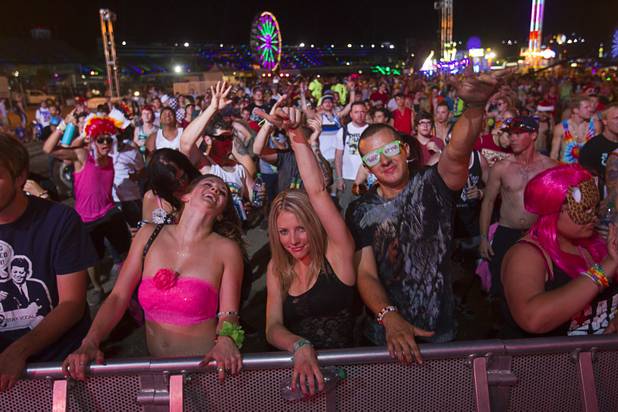 Festival-goers listen to Culture Shock at the bassPOD stage during the third day of the Electric Daisy Carnival at the Las Vegas Motor Speedway Sunday, June 23, 2013.