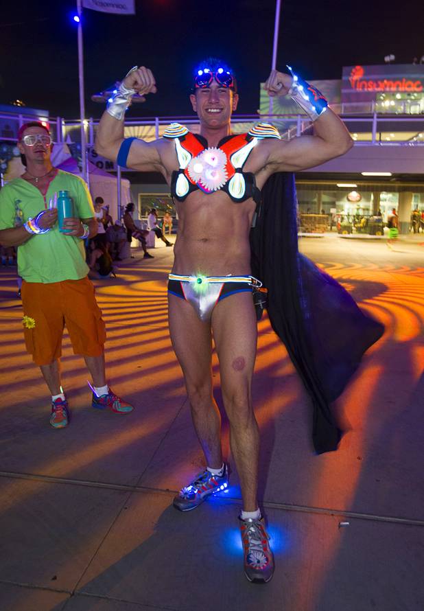 Jonathan Williams, 27, of Las Vegas, shows off his costume during the third day of the Electric Daisy Carnival at the Las Vegas Motor Speedway Sunday, June 23, 2013.  Williams spent a year of planning and more than 40 hours creating the illuminated costume, he said.