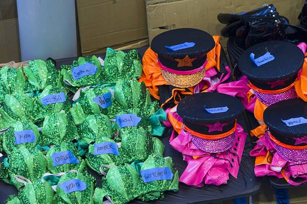 Costumes for performers are organized on a table during the third day of the Electric Daisy Carnival at the Las Vegas Motor Speedway Sunday, June 23, 2013.
