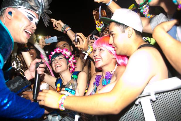 Luke Steele of Empire of the Sun interacts with the crowd during night 2 of the Electric Daisy Carnival, Saturday June 22, 2013.