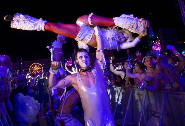 Performers are shown during the third day of the Electric Daisy Carnival at the Las Vegas Motor Speedway early Monday morning, June 24, 2013.