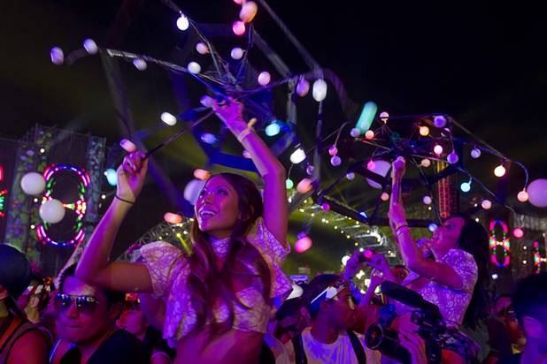 Performers  are shown during the third day of the Electric Daisy Carnival at the Las Vegas Motor Speedway early Monday morning, June 24, 2013.