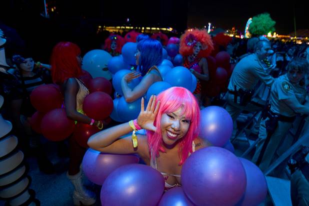 A performer poses during the third day of the Electric Daisy Carnival at the Las Vegas Motor Speedway early Monday morning, June 24, 2013.