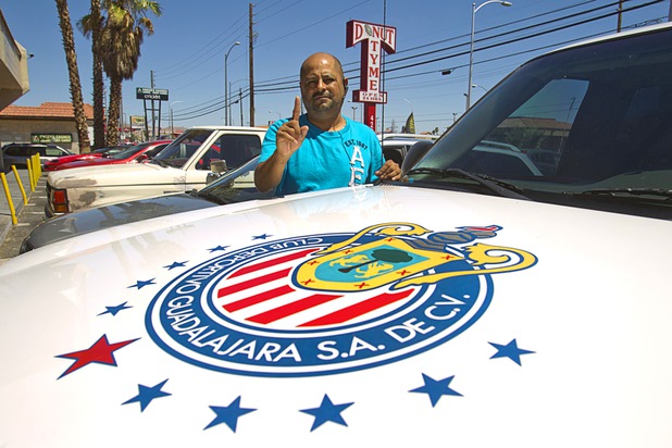 Juan Zaragosa, restaurant manager, poses being his truck adorned with the Chivas crest at the El Birotazo Mexican restaurant, 4262 E. Charleston Blvd., Wednesday, June 26, 2013. The restaurant owners are huge fans of the Chivas soccer team. Chivas (Guadalajara) and Club America (Mexico City), two of the most popular soccer teams in Mexico, play each other at Sam Boyd Stadium on Wednesday, July 3.