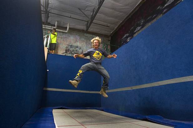 Co-owner Jeff Jay bounces on a trampoline at the Hardkore Parkour (HKPK) gym, 3680 N. 5th St., Thursday, June 27, 2013.