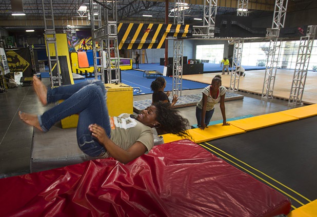 Destiny Matthews, 16, a member of the Victory Baptist Church STARS Youth Ministry, flips on a tumble track at the Hardkore Parkour (HKPK) gym, 3680 N. 5th St., Thursday, June 27, 2013.
