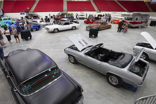 Classic cars are displayed during the inaugural Art N Ink Festival at the South Point Sunday, June 30, 2013.