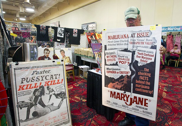 Eric Caidin, owner of Hollywood Book & Poster Company, displays an original 1968 "Maryjane" movie poster during the inaugural Art N Ink Festival at the South Point Sunday, June 30, 2013. Caidin, who specializes in cult and exploitation movies, used to come to Las Vegas for movie festivals at the Huntridge Theater, he said.
