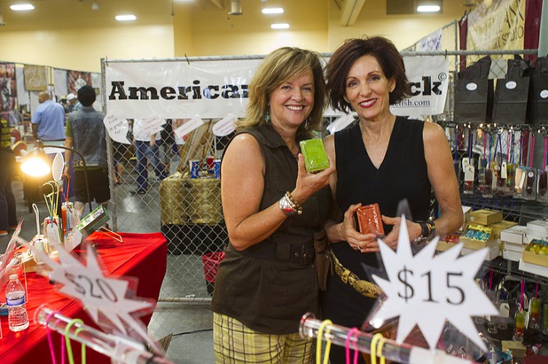 Partners Shane O'Brien, left, and Patrice O'Conner pose at the Soap Fetish booth during the inaugural Art N’ Ink Festival at the South Point Sunday, June 30, 2013. 