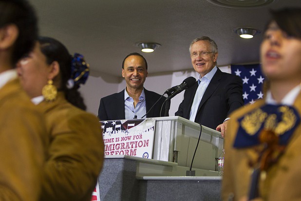 Congressman Luis Gutierrez, left, (D-IL) and Senate Majority Leader Harry Reid (D-NV) listen to a performance by "Mariachi Los Gavilanes" during a rally for immigration reform at the Culinary Workers Union, Local 226, headquarters Monday, July 1, 2013.