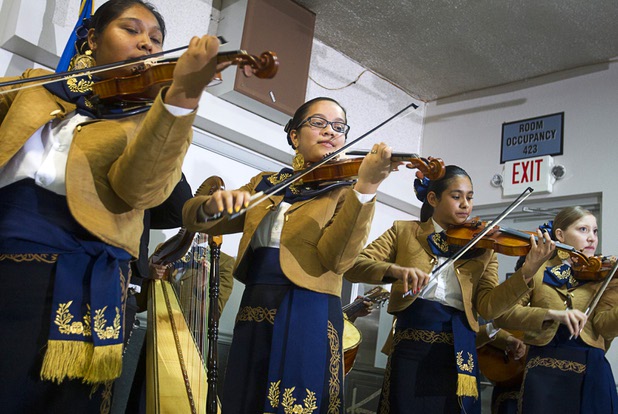 Members of "Mariachi Los Gavilanes" perform during a rally for immigration reform at the Culinary Workers Union, Local 226, headquarters Monday, July 1, 2013.