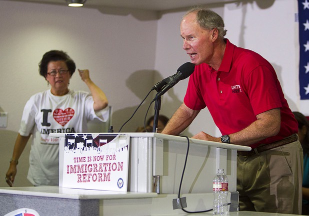 D. Taylor, president of UNITE Here, speaks during a rally for immigration reform at the Culinary Workers Union, Local 226, headquarters Monday, July 1, 2013. Gloria Caoile, political director of the National Asian Pacific American Labor Alliance, cheers at left.