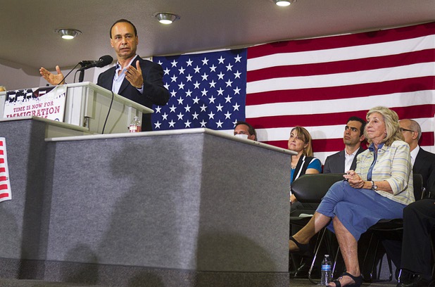 Congressman Luis Gutierrez, left, (D-IL) speaks during a rally for immigration reform at the Culinary Workers Union, Local 226, headquarters Monday, July 1, 2013. Congresswoman Dina Titus (D-NV) listens at right.