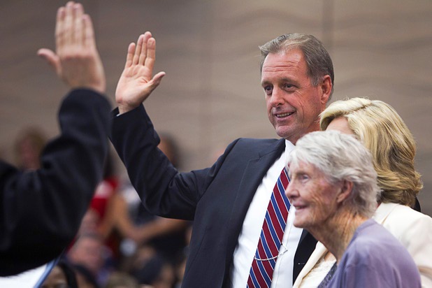 North Las Vegas Mayor John Lee is sworn in by Municipal Judge Sean Hoeffgen during an oath of office ceremony at North Las Vegas City Hall Monday, July 1, 2013.
