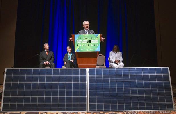 Senate Majority Leader Harry Reid (D-NV) speaks during a news conference at the Mandalay Bay Convention Center Tuesday, July 2, 2013. With Reid from left are: Chuck Bowling, Mandalay Bay Resort president and COO, U.S. Secretary of the Interior Sally Jewell, and Rose McKinney-James, chairwoman of the Clean Energy Project. MGM Resorts International and NRG Energy announced a partnership to install one of the largest contiguous roof-top solar photovoltaic arrays in the world on the roof of the convention center.