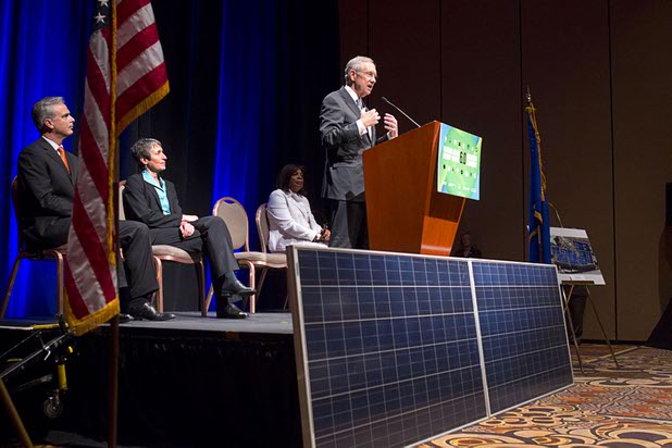 Senate Majority Leader Harry Reid (D-NV) speaks during a news conference at the Mandalay Bay Convention Center Tuesday, July 2, 2013. With Reid from left are: Chuck Bowling, Mandalay Bay Resort president and COO, U.S. Secretary of the Interior Sally Jewell, and Rose McKinney-James, chairwoman of the Clean Energy Project. MGM Resorts International and NRG Energy announced a partnership to install one of the largest contiguous roof-top solar photovoltaic arrays in the world on the roof of the convention center.