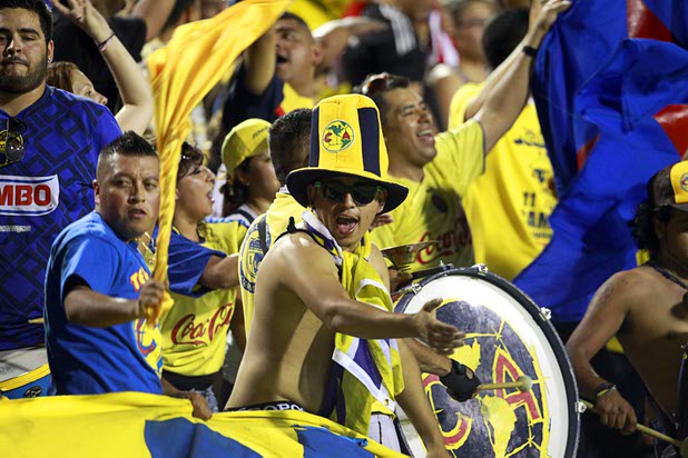 Club America fans cheer on their team during El Super Clasico soccer game at Sam Boyd Stadium Wednesday July 3, 2013.
