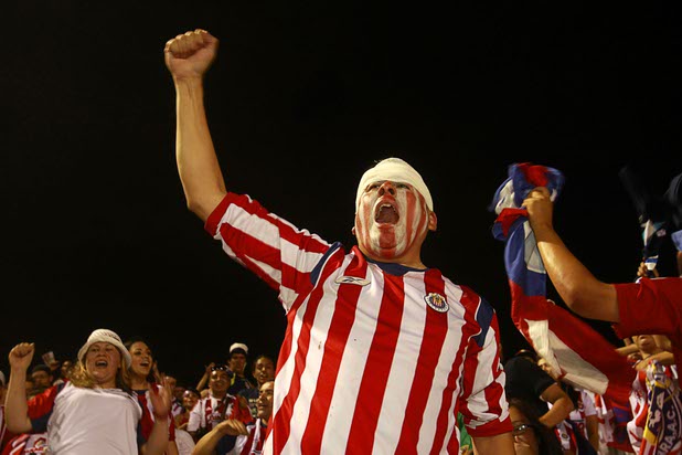 Mark Garcia of Los Angeles cheers for Chivas Guadalajara during El Super Clasico soccer game at Sam Boyd Stadium Wednesday July 3, 2013.