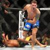 Chris Weidman leaps up after knocking out Anderson Silva in the second round of their middleweight title fight at UFC 162 Saturday, July 6, 2013 at the MGM Grand Garden Arena. Weidman upset Silva with a second round knockout, taking the belt Silva has held since 2006.