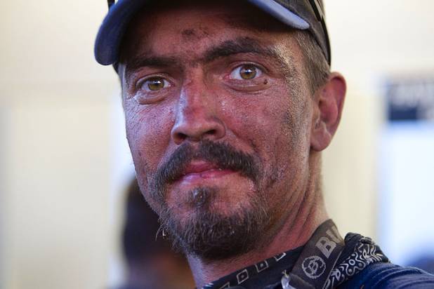 Randy Dodson of Merill, Ore. is shown in Pahrump after a day of fighting wildfires Sunday, July 7, 2013.