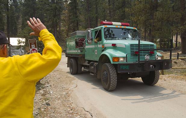 A Forest Service fire crew heads out from an administrative area on Mount Charleston Tuesday, July 9, 2013.