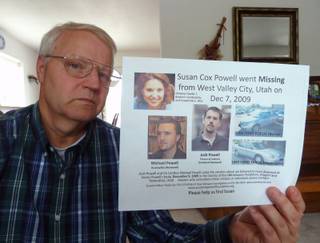 Chuck Cox holds a postesr seeking information in the 2009 disappearance of his daughter, Susan Powell. Police have suspended their case with the death of Powell's husband, who killed himself and their children, but Cox is still searching. He is shown at home in Puyallup, Washington, in July 2013. (John M. Glionna/Los Angeles Times/MCT)