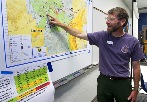Carpenter 1 Fire PIO Jon Kohn talks to reporters about the Mount Charleston wildfire during a briefing at Centennial High School Sunday, July 14, 2013.