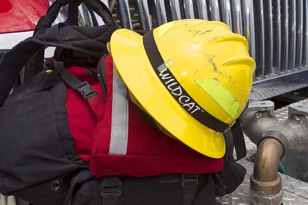 Wildfire gear is displayed on a brush truck from Dayton, Nev. at Centennial High School Sunday, July 14, 2013.