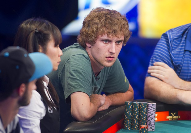 Ryan Riess of East Lansing, Mich competes during the seventh day of the World Series of Poker $10,000 buy-in no-limit Texas Hold 'Em at the Rio Monday, July 15, 2013.