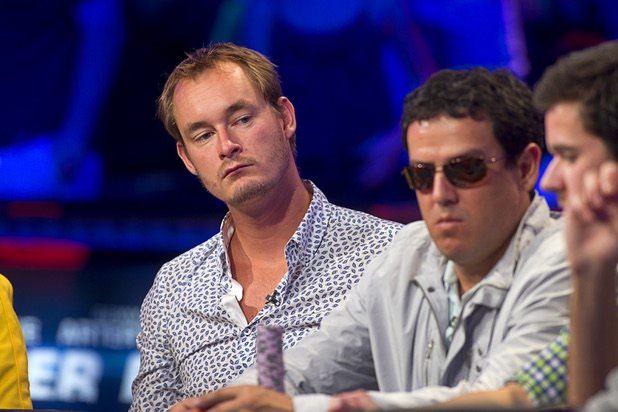Michiel Brummelhuis, left, of the Netherlands competes during the seventh day of the World Series of Poker $10,000 buy-in no-limit Texas Hold 'Em at the Rio Monday, July 15, 2013.