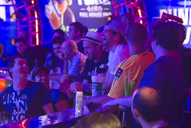 Spectators cheer during the seventh day of the World Series of Poker $10,000 buy-in no-limit Texas Hold 'Em at the Rio Monday, July 15, 2013.