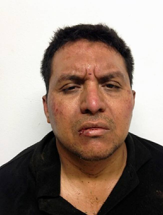 This mug shot released by Mexico's Interior Ministry on Monday, July 15, 2013, shows Zetas drug cartel leader Miguel Angel Trevino Morales after his arrest. 