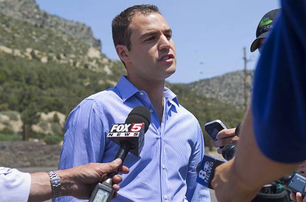 Michael Crandall, senior vice president of the Siegel Group, speaks to reporters at the Resort at Mount Charleston Thursday, July 18, 2013. The Siegel Group owns the resort. The mountain is expected to reopen to the public on Friday.